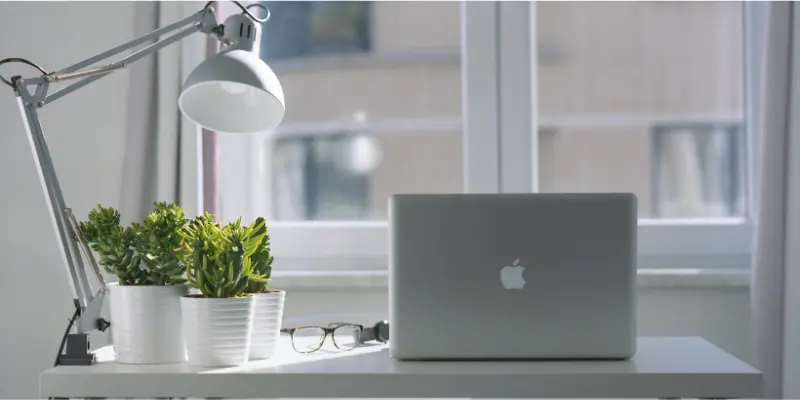 Adjustable desk lamp and ambient lighting for a well-lit home office